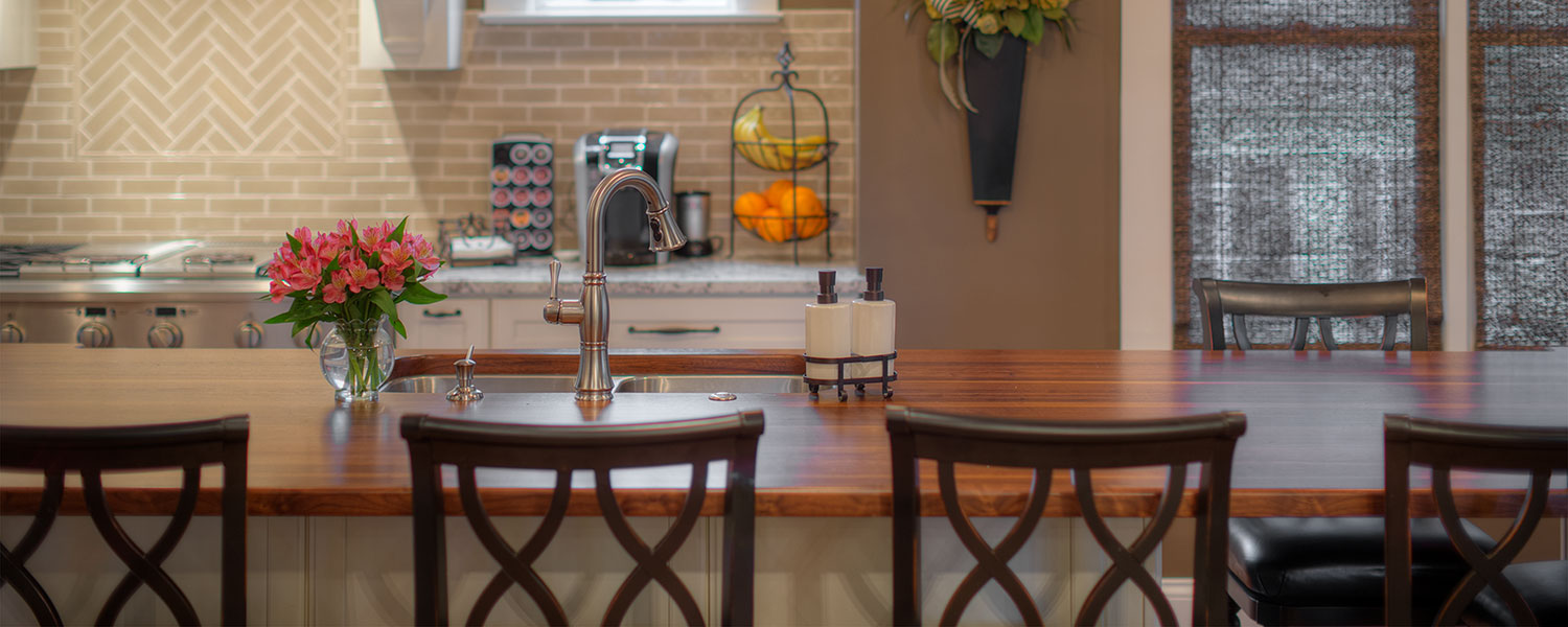 A custom made wooden counter within a kitchen