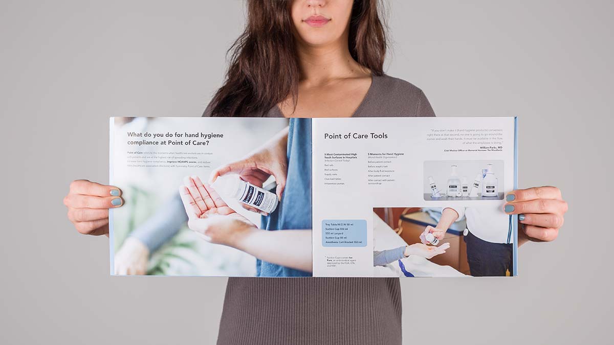 A photo showing a symmetry pamphlet that contains a blurb about hand hygiene and also Point of Care Tools